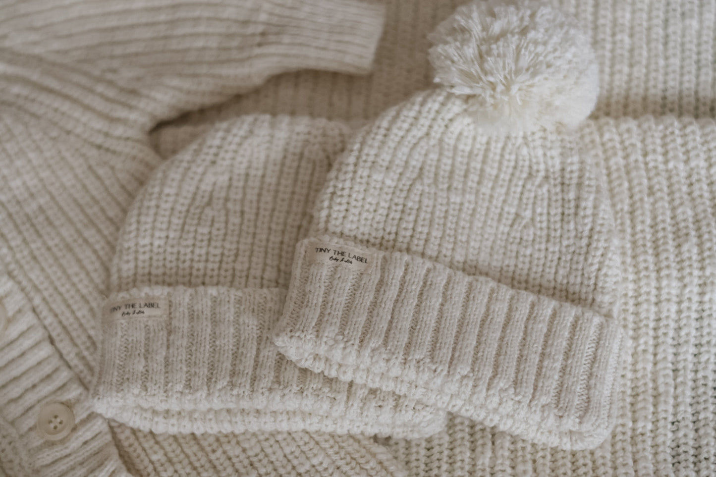 NEWBORN BABYMUTS Baby Parel (met PomPom)