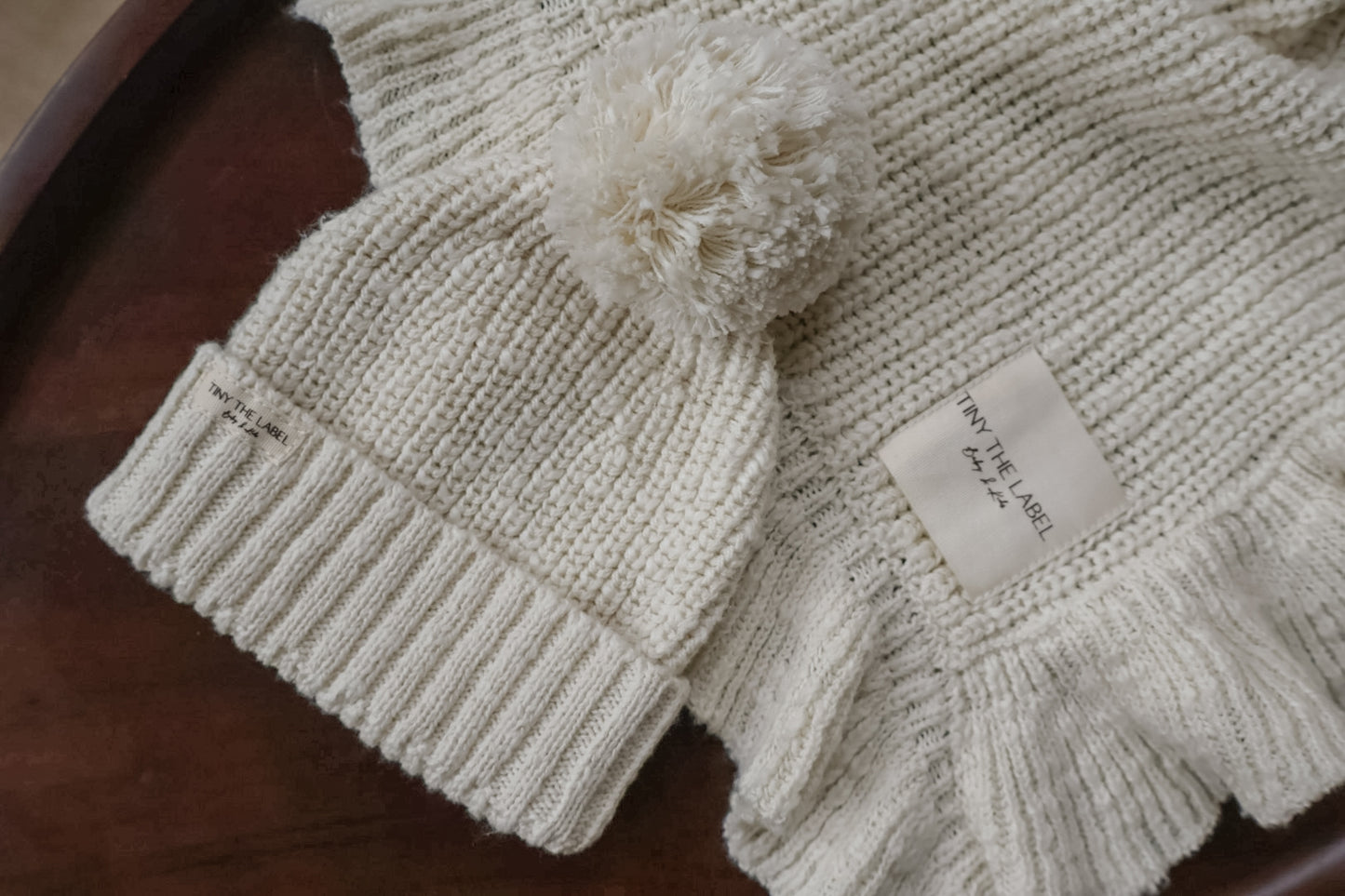 NEWBORN BABYMUTS Baby Parel (met PomPom)